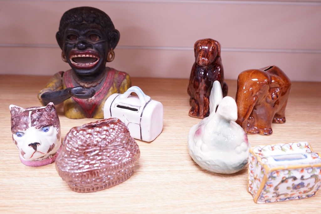 A collection of eight novelty money boxes, including a Dinah painted metal mechanical money box. Dinah money box 18cm high. Condition - some scuffing to paintwork and decoration on four.